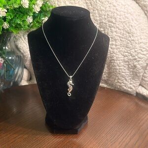 Silver-tone seahorse pendant necklace with faux abalone center